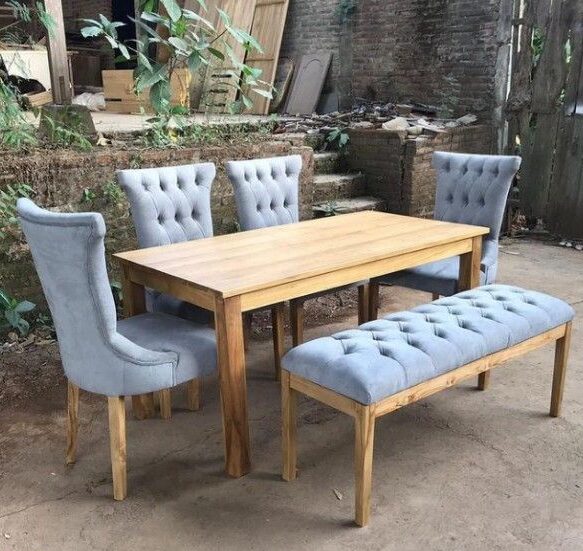 wooden dining table and upholstered chairs set