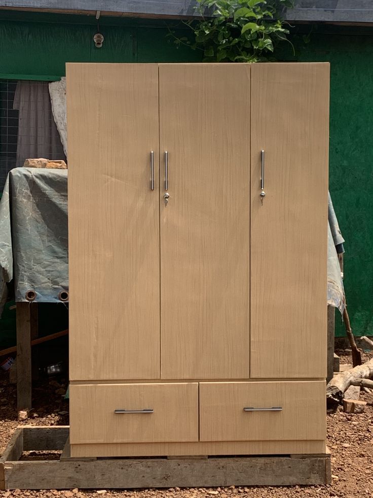 three-door wardrobe with two drawers