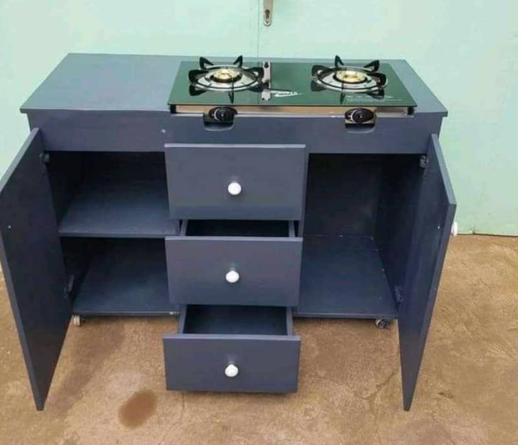 a wooden kitchen cabinet