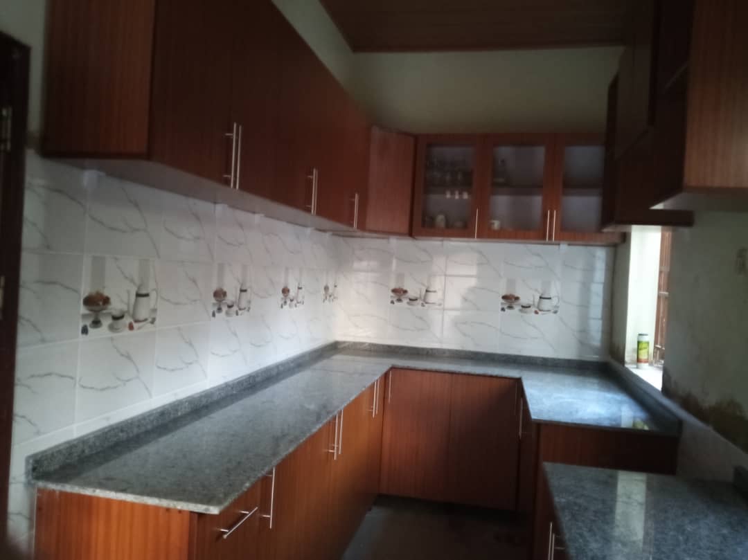 a modern U-shaped modular kitchen