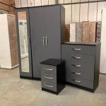 101/01 mirrored wardrobe, chest of drawers, and a bedside table