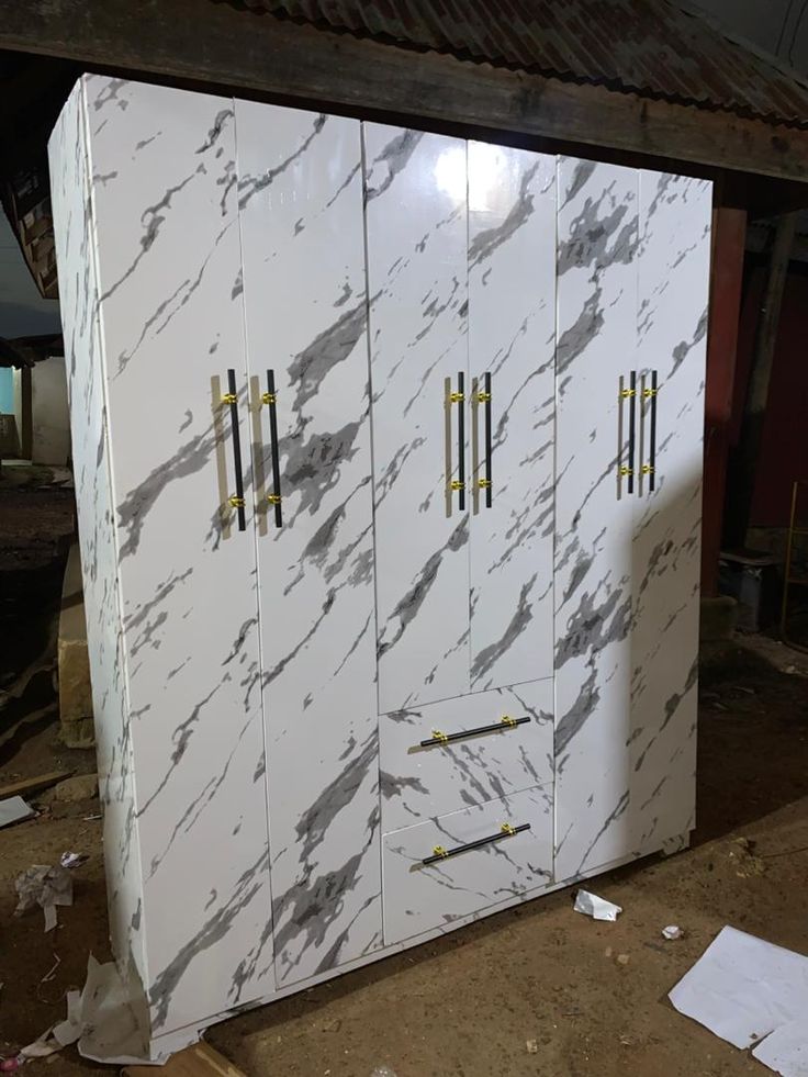 wardrobe with a white and gray marble finish