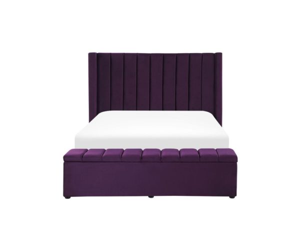 velvet upholstered double bed with a storage bench