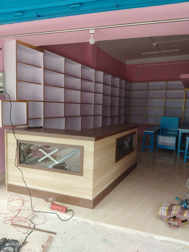 retail store interior featuring custom wooden shelves and a service counter