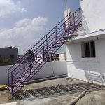 101/12 an outdoor, custom-built metal staircase