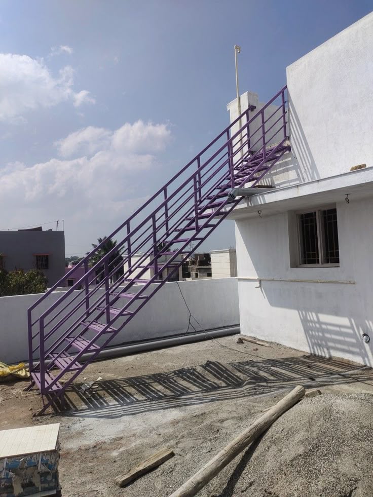 an outdoor, custom-built metal staircase