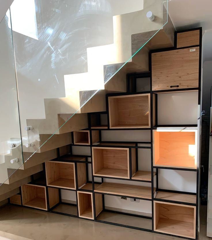 custom-built under-stairs shelving and storage unit