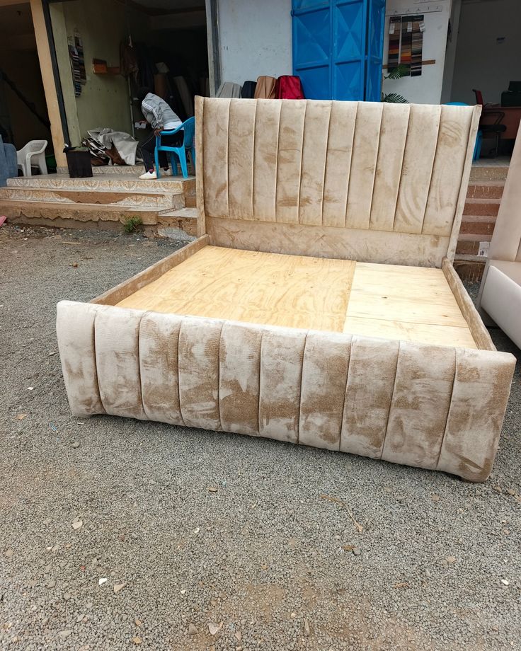 cream upholstered queen-size bed