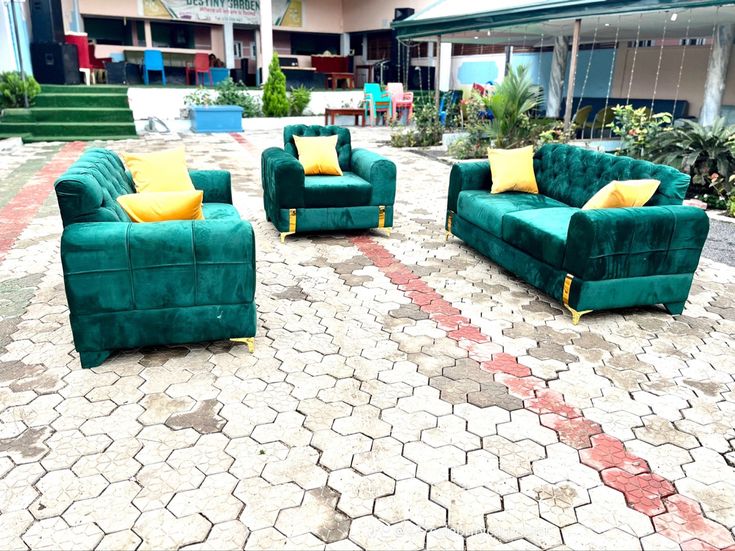 a modern green velvet five-seater sofa set