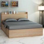 112/05 modern bedroom featuring a king-size bed with a paneled headboard
