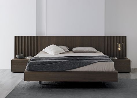a Mies 1.6 modern bed with a walnut headboard